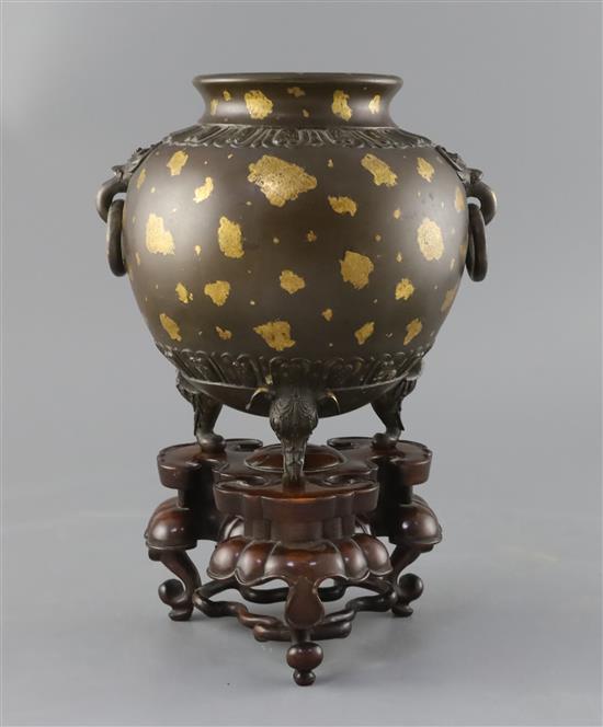A fine and rare Chinese gold splashed bronze globular censer, 17th/18th century, with Qing dynasty triple ruyi head hardwood stand